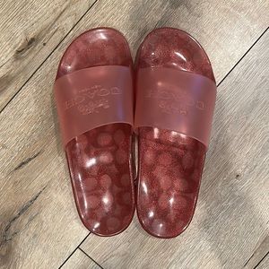 Coach slides. red with sparkles.